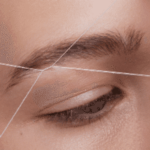 Threading Birmingham AL specialist performing gentle, chemical-free eyebrow threading